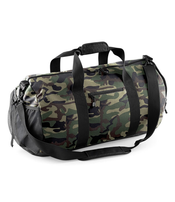 Water resistant fabric. Padded hand grip. Detachable adjustable contrast shoulder strap with pad. Haul handle. Authentic metal ventilation eyelets. Main zip compartment. Front zip valuables pocket. End zip pocket. External mesh ball pocket. Shoe tunnel/wet pocket. Tear out label. Capacity 58 litres.