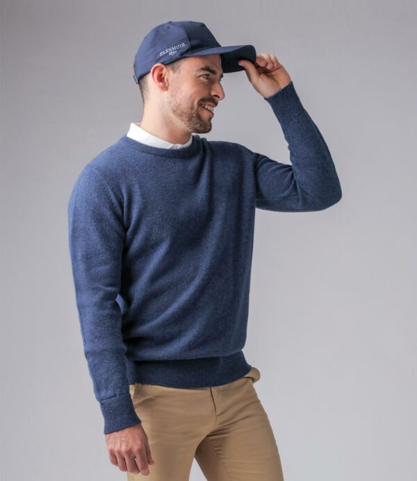 "15 gauge. Set in sleeves. Breathable. Ribbed knit neck