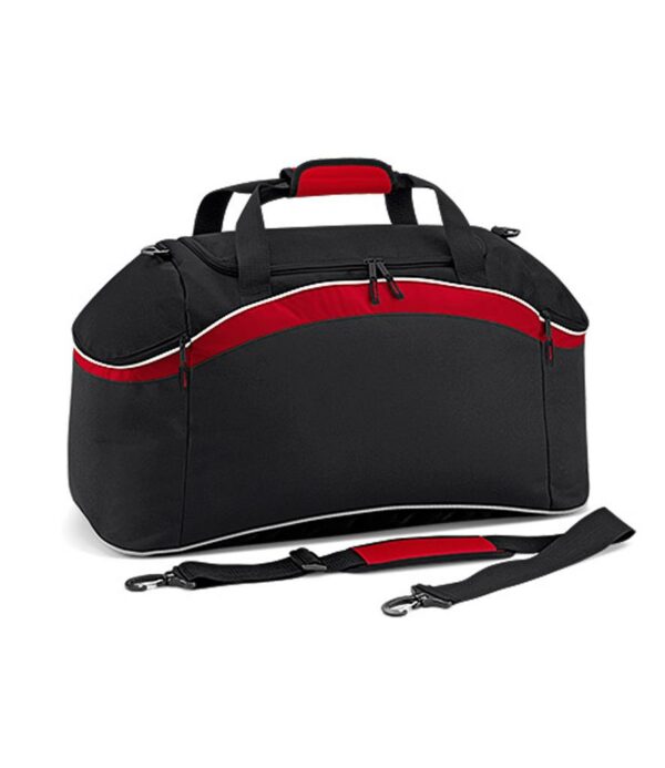 Padded hand grip. Detachable adjustable webbing shoulder strap with pad. Large main zip compartment. End zip pockets. Internal baseboard. Protective base feet. Enhanced visibility reflective piping. Capacity 54 litres.