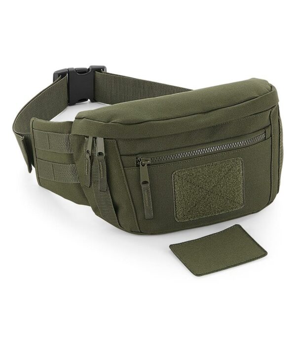"Military inspired design. Adjustable webbing belt with secure clip closure. Main zip compartment. Front zip pocket. Interchangeable Rip-Strip™ patch designed for decoration. MOLLE webbing loop detail. Tear out label. Capacity 3 litres. Compatible with MOLLE utility patch