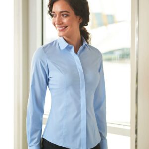 Easy care stretch fabric. Semi-fitted. Rounded collar. Concealed placket. Princess seams. Back yoke. Single button cuffs. Curved hem.
