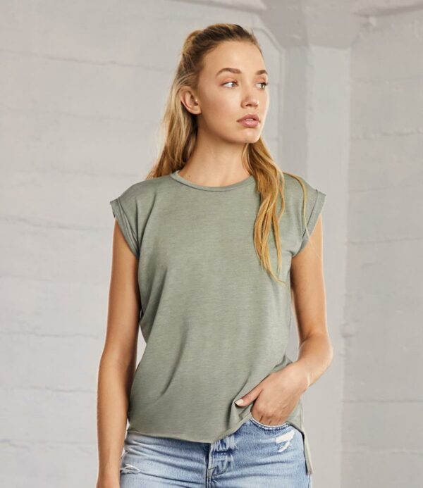 Relaxed draped fit. Ribbed collar. Rolled up cuffs. Side seams. Raw edge drop hem. Tear out label.