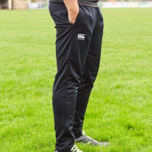 Vapodri wicking technology. Breathable and quick drying. Elasticated waistband with inner drawcord. Two side zip pockets. Covered ankle zips. Branding on right thigh.