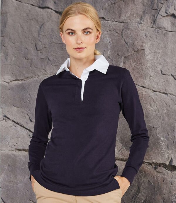 Semi-fitted style. Traditional rugby collar with cotton webbing. Taped neck. Concealed three button placket. Elastane ribbed cuffs. Taped side vents.  Twin needle hem. For leisure use only.
