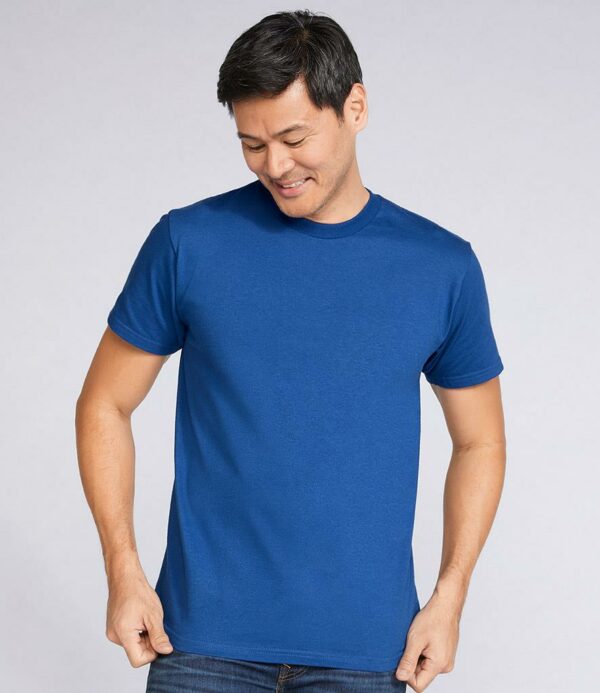 Seamless ribbed collar. Taped neck and shoulders. Tubular body. Twin needle sleeves and hem. Tear out label.