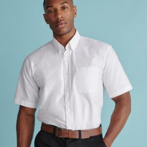 Wrinkle resistant fabric. Button down collar. Left chest pocket. Pearlised buttons. Back yoke with centre pleat. Curved hem.