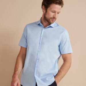 Easy care fabric. Modern tailored fit. Cut away collar. Self colour pearlised buttons. Back darts. Curved hem. Cut out label.