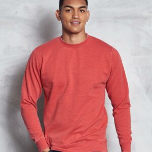 "Soft cotton faced fabric. Brushed back fleece. Washed effect. Drop shoulder style. Fashion fit. Ribbed collar