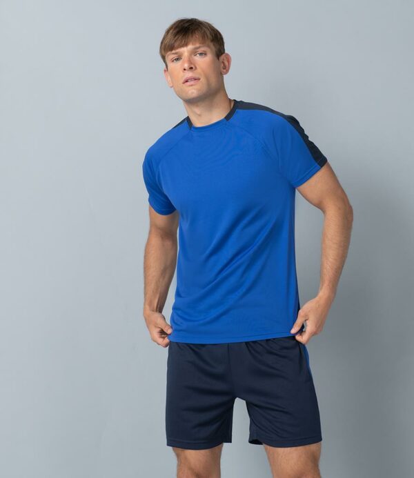 "Single jersey. Wicking finish keeps you dry and comfortable. Raglan sleeves. Taped neck. Contrast back collar