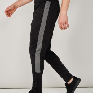 Slim leg. Elasticated waistband with inner drawcord. Two side zip pockets. Contrast side panels. Ankle zips with zip guard and semi-automatic lock zip sliders.