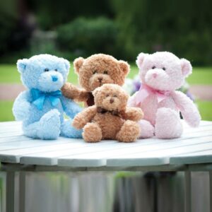 "Plush bear in a range of colours. Colour matching ribbon