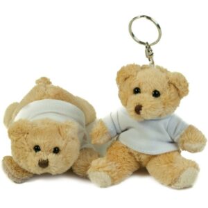 Two options. Key ring - light brown coloured small bear with key ring attachment. Magnet - light brown coloured small bear with magnets in 4 paws. Both come wearing a removable white cotton t-shirt.