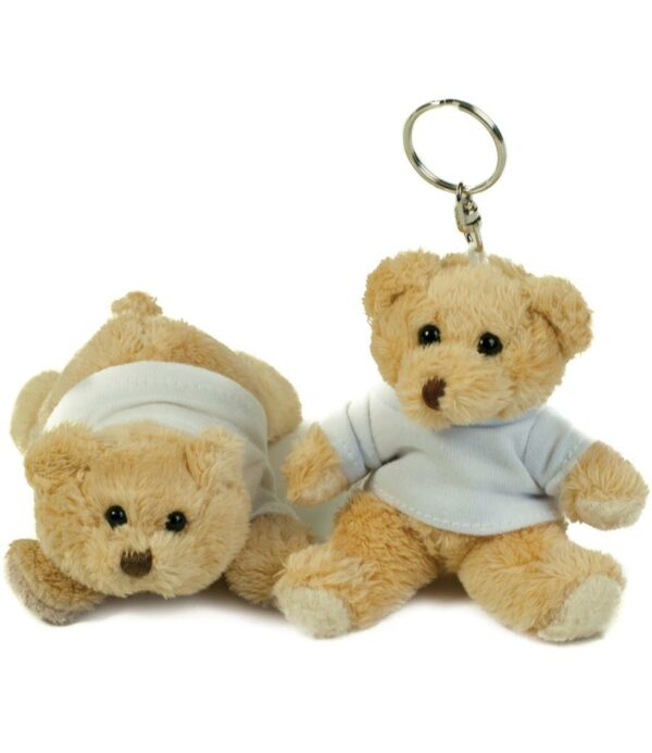 Two options. Key ring - light brown coloured small bear with key ring attachment. Magnet - light brown coloured small bear with magnets in 4 paws. Both come wearing a removable white cotton t-shirt.