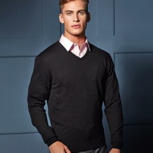 "12 gauge. Fine knit. Easy care. Set in sleeves. Soft feel and contemporary styling. Ribbed knit neck