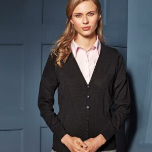 "12 gauge. Fine knit. Easy care. Soft feel and contemporary styling. Set in sleeves. Ribbed knit neck
