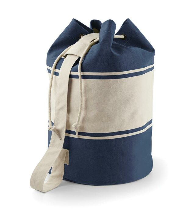 Navy/natural ready to dye cotton. Rope drawcord closure. Self fabric shoulder strap. Capacity 30 litres.