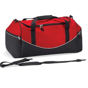 Padded hand grip. Detachable adjustable shoulder strap with pad. Two large end pockets. Internal baseboard. Protective base feet. Capacity 55 litres.