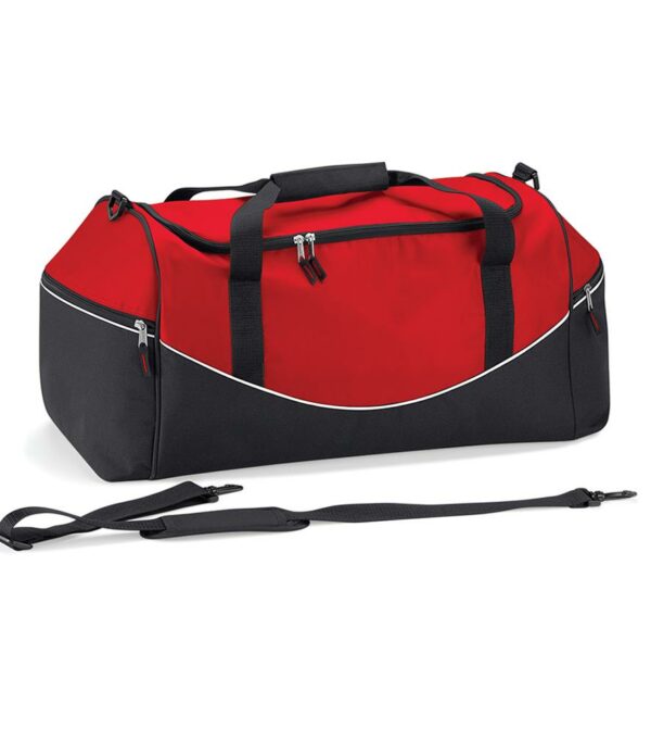 Padded hand grip. Detachable adjustable shoulder strap with pad. Two large end pockets. Internal baseboard. Protective base feet. Capacity 55 litres.