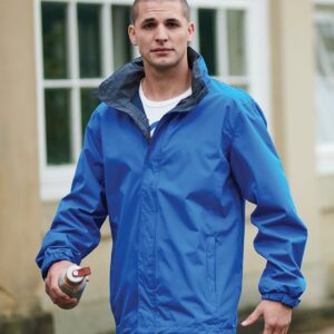 Polyester mesh lining. Waterproof with taped seams. Windproof. Concealed adjustable hood. Collar high full length zip with tear release storm flap. Inner pocket with ear phone cord access. Two front zip pockets. Part elasticated adjustable cuffs. Adjustable drawcord hem. Cut out label. Zip access for decoration.