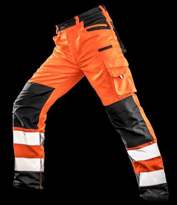 Conforms to EN ISO 20471: 2013 + A1: 2016 class 2. RIS-3279-TOM (orange only). Part elasticated high comfort waistband with belt loops. Zip fly with button over. Two side zip pockets. Black external knee pad pockets. Left thigh multi-use pocket. Rear patch and ruler pockets. Hammer loop. Two reflective bands around lower legs. Bar tack stress points. Cut out label.