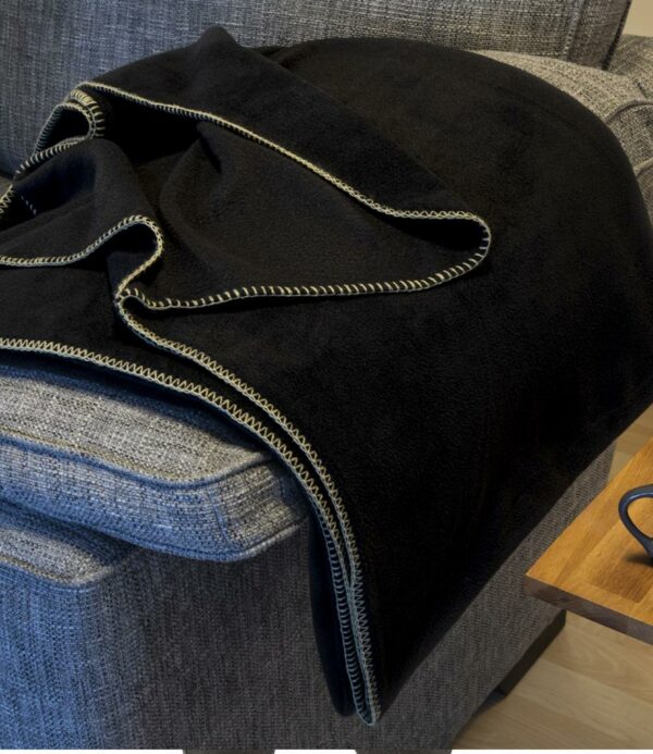 Pill resistant. Quick drying. Chunky natural contrast stitched edging. Machine washable. Cut out label.