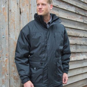 "Polyester padding. Polyester taffeta lining. Waterproof 2000mm with taped seams. Windproof. Concealed detachable hood with adjusters. Full length heavy duty two way zip with studded storm flap. Ten pockets including large lower pockets