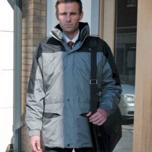 "Polyester lining. Polyester padding. Waterproof 2000mm with taped seams. Windproof. Main jacket has a concealed adjustable lined hood. Full length two way zip with stud and tear release storm flap. Various pockets including two deep front