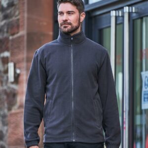 Modern unisex style.Unlined.Collar high full length zip.Two front zip pockets.Elasticated cuffs.Adjustable drawcord hem.Twin needle stitching.60°C wash.