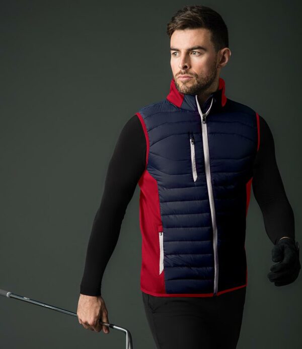 "Contrast polyester jersey collar and side panels. Polyester padding. Brushed back fleece. Showerproof