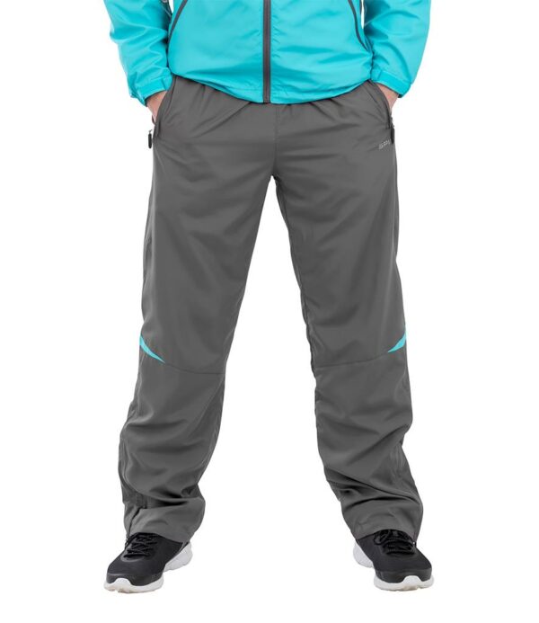 50D microfibre. Mesh lined. Quick drying. Anti-static. Showerproof and breathable. Mesh lined upper leg. Polyester lined lower leg. Elasticated waistband with inner drawcord. Reflective piping on rear. Open hem with ankle zip. Ventilation panels in sweat zones. Reflective branding on left leg.
