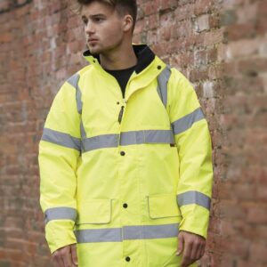 "Quilted lining. Conforms to EN ISO 20471: 2013 + A1: 2016 class 3. EN343: 2003 + A1: 2007 class 3.1. RIS-3279-TOM (orange only). Waterproof with fully taped seams	. Concealed adjustable hood. Collar high full length two way zip with studded storm flap. Two reflective bands around the body