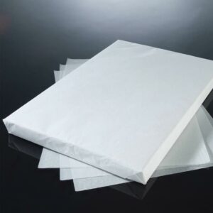Used to protect the garment or product during heat application. To use with a flat bed heat press. Sold in packs of 500 sheets. Non-returnable.