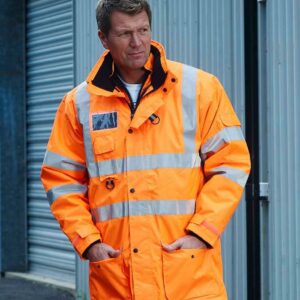 "Polyester mesh lined. Conforms to EN ISO 20471: 2013 + A1: 2016 class 3. RIS-3279-TOM (orange and orange/navy only). Outer jacket is waterproof with stitched and taped seams. Windproof. Concealed detachable hood. Full length zip with a studded storm flap. Two reflective bands around the body