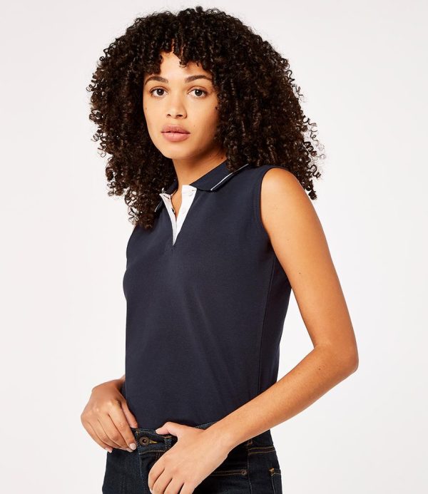 Ladies cut.Contrast stripe in collar.Contrast taped neck.Three button placket with contrast inner.Hemmed armholes.Contrast taped side vents.Twin needle stitching.